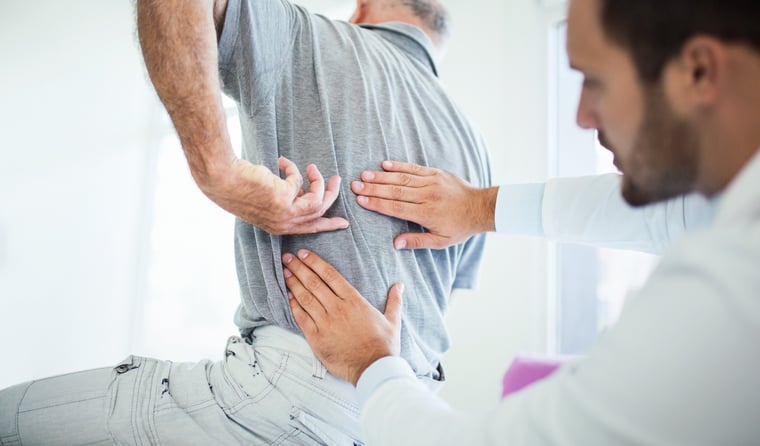 iStock-857090084_indicating pain in back