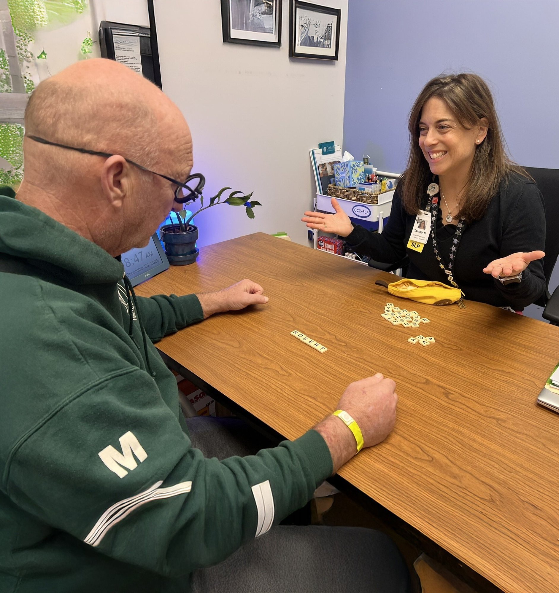 Tammy and patient with glasses_outpatient speech therapy_approved